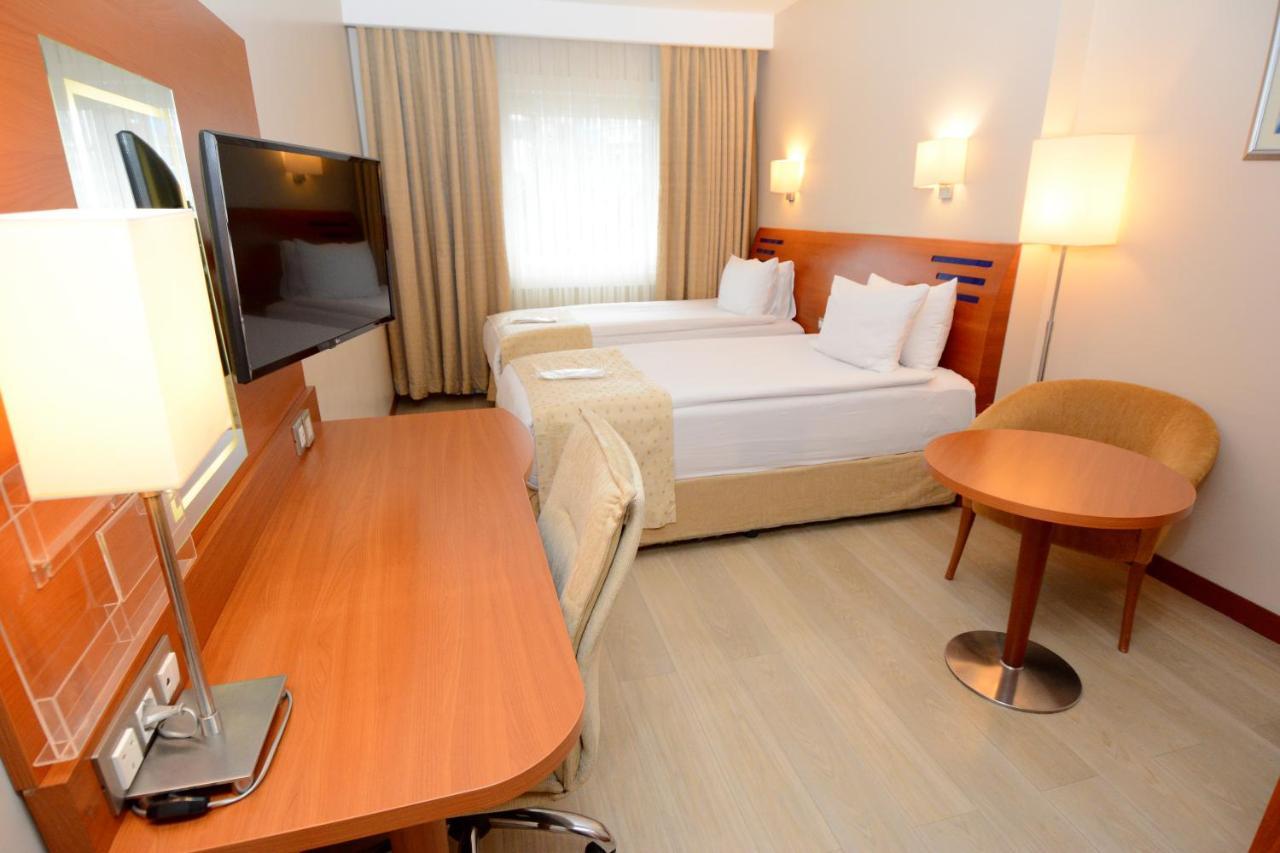 Holiday Inn Istanbul City By Ihg Exterior foto A room at the hotel