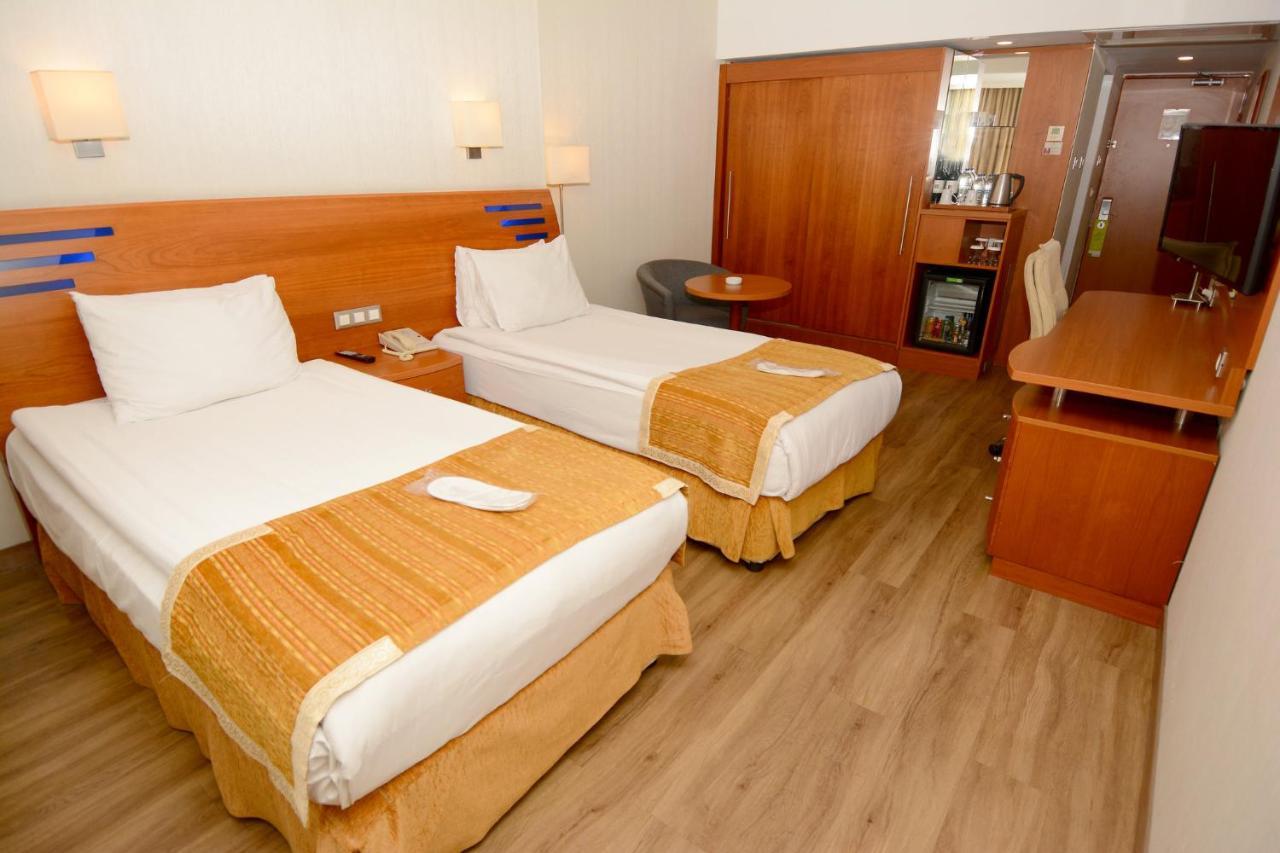 Holiday Inn Istanbul City By Ihg Exterior foto A room at the hotel